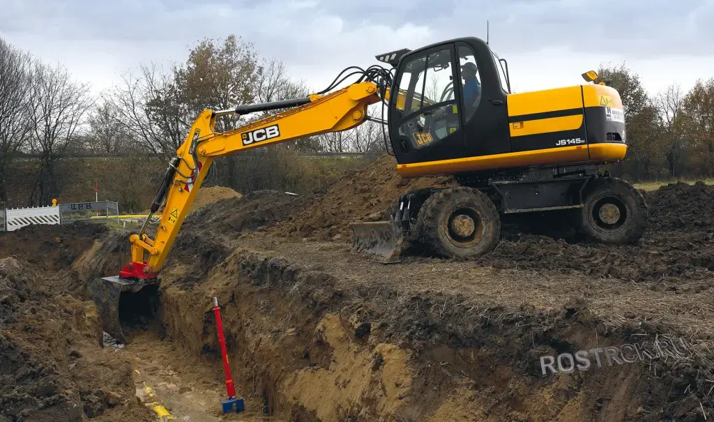 Аренда колесного экскаватора полноповоротного, С ковшом и гидромолотом