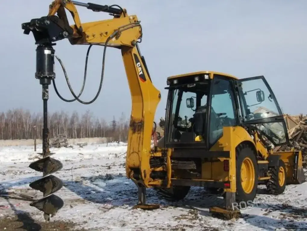 Аренда ямобура на базе экскаватора-погрузчика